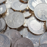 Silver Pulls Back from Nearly 14-Year High as Dollar Strengthens